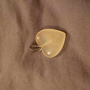 Carnelian Heart pendant with a silver tone bail